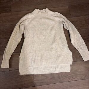 Cream sweater.